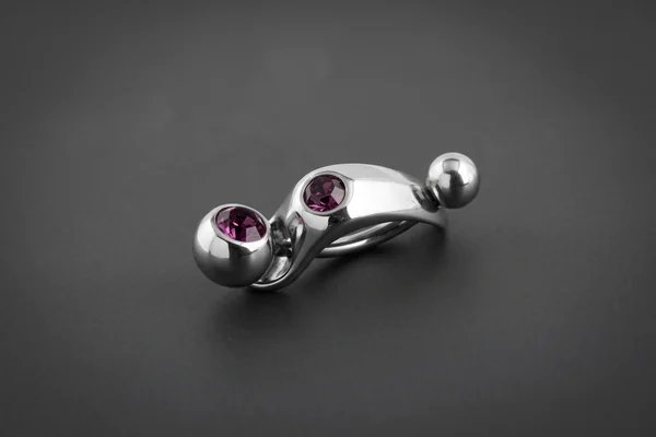 Silver intimate jewellery with purple gemstones